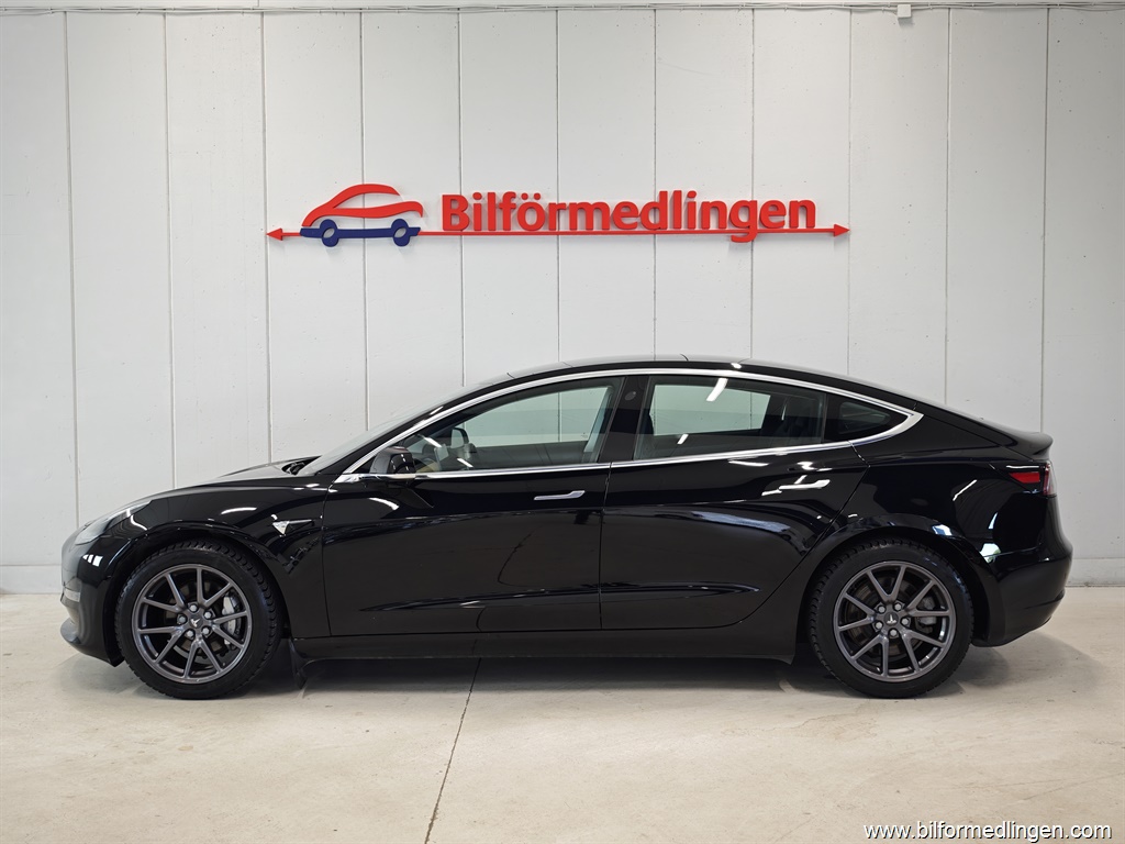 Bild 1 på Tesla Model 3)